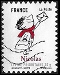 Nicolas avec une lettre